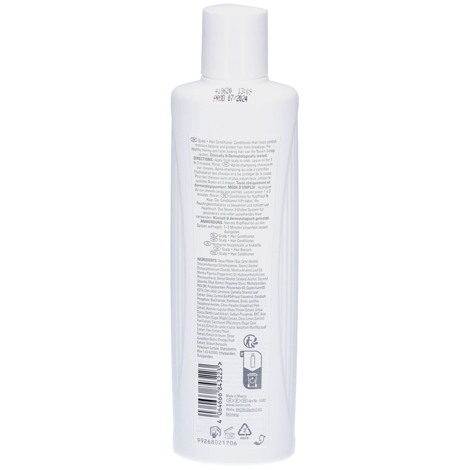 Dos d'un flacon blanc. Texte et symboles. Inscription: Nioxin, après-shampooing, mode d'emploi, ingrédients.