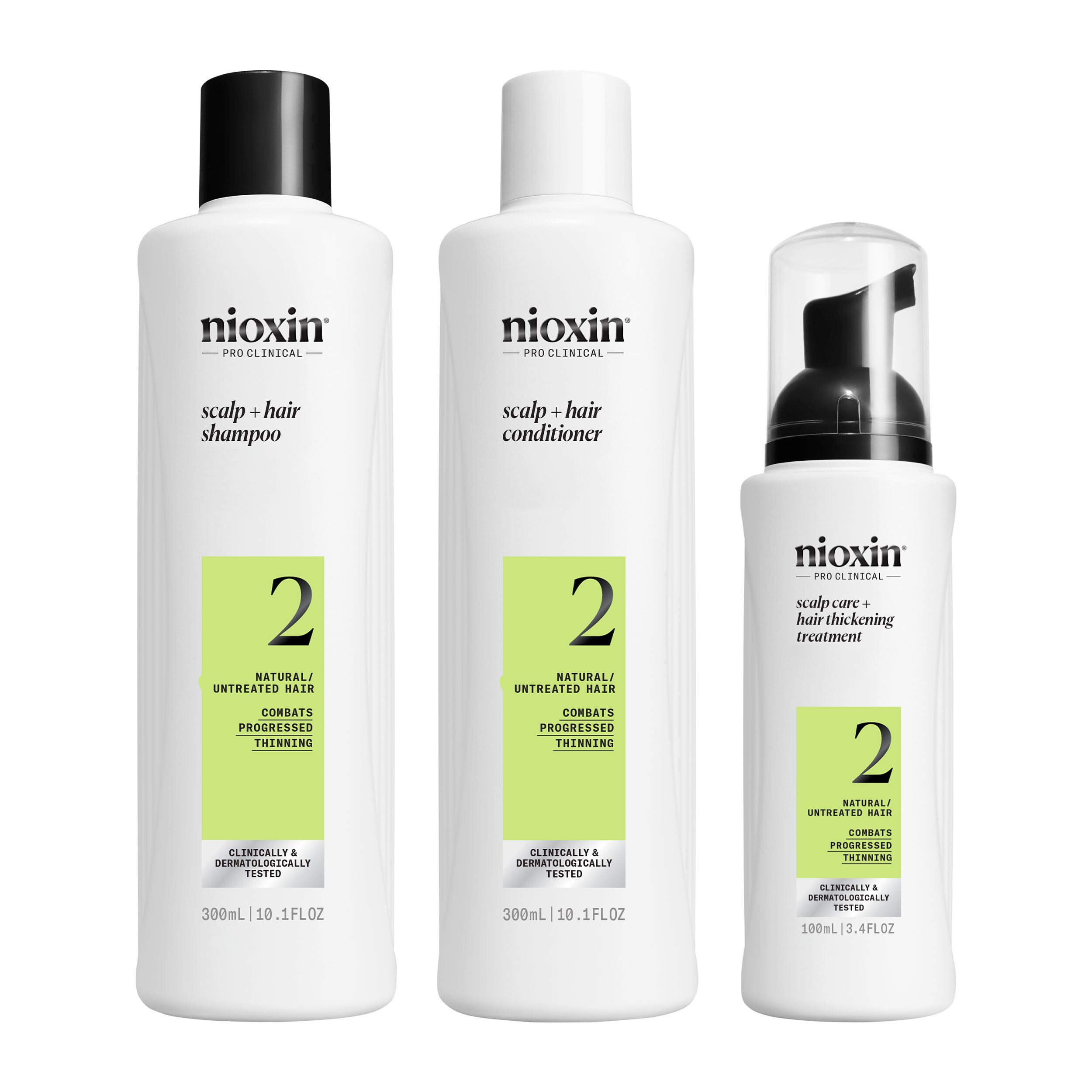 Drie Nioxin producten: shampoo, conditioner en treatment. Witte flessen met zwarte doppen en groene etiketten.