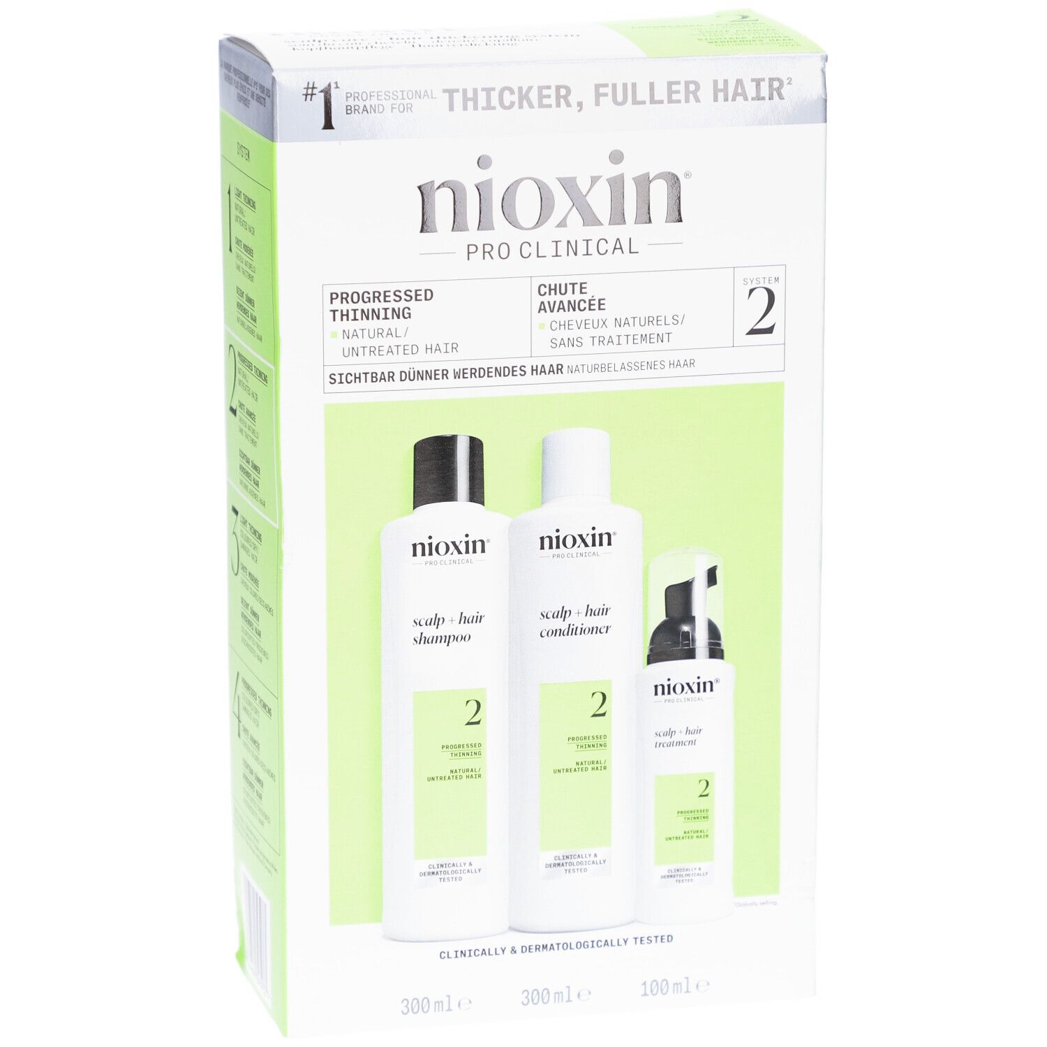 Nioxin System 2 Coffret. Bevat shampoo, conditioner en treatment. Groen-witte verpakking met productnaam en informatie.