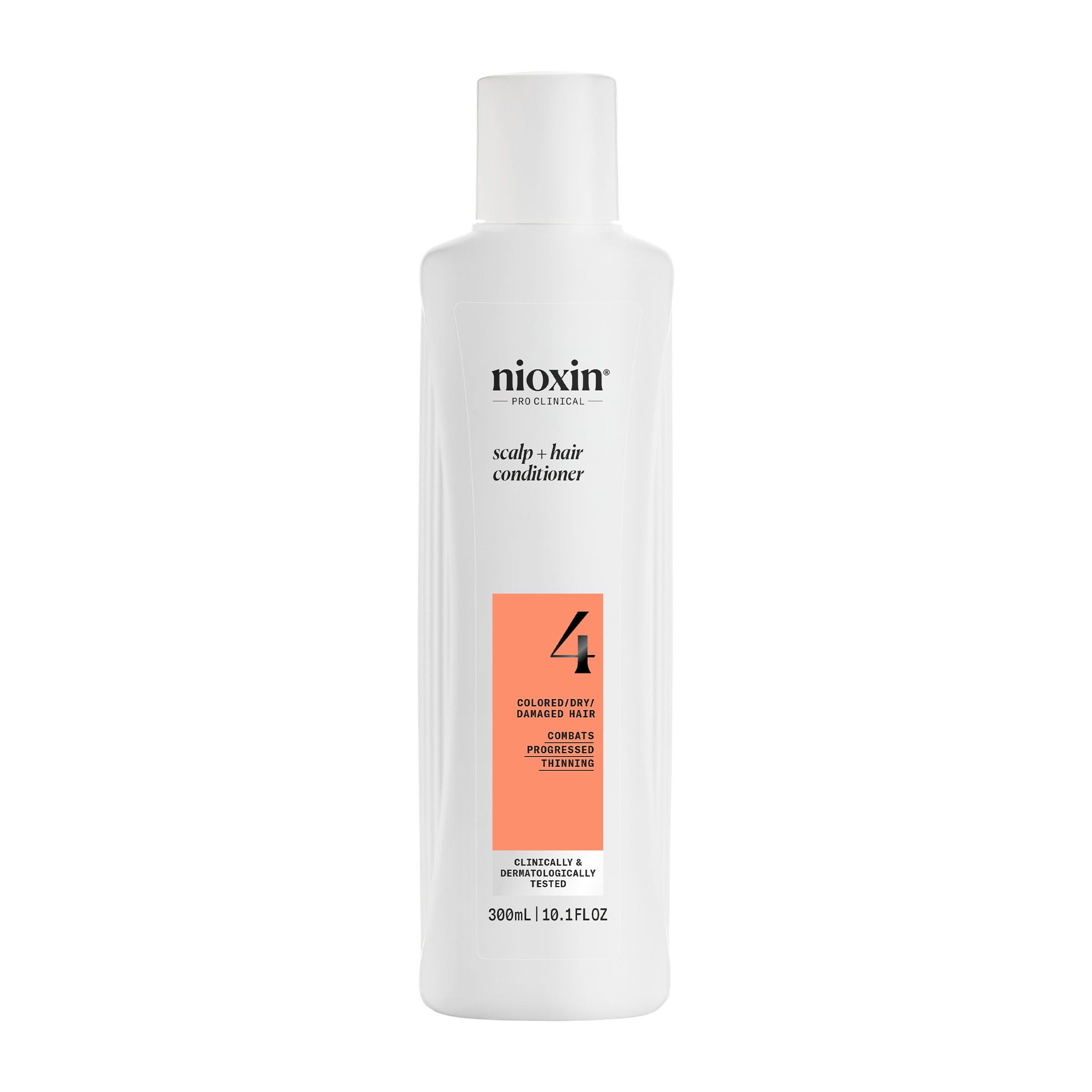 Witte fles Nioxin conditioner. Oranje etiket met tekst. 300ml. Voor gekleurd, dunner wordend haar.