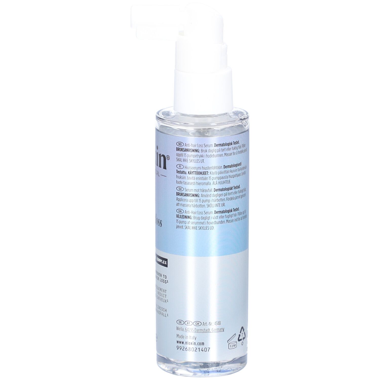 Flacon de sérum avec pompe. Inscriptions: Nioxin, sérum anti-chute, 70ml. Texte multilingue.
