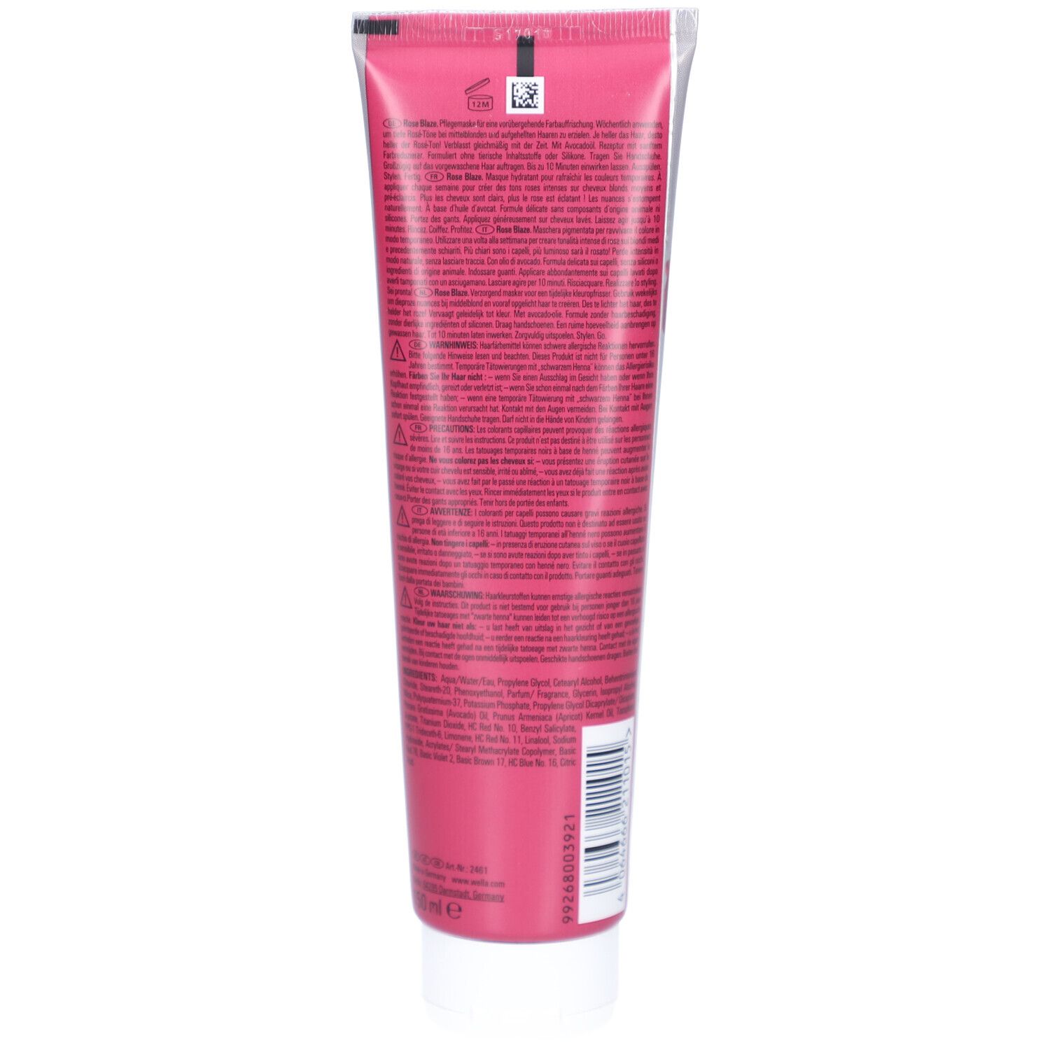 Dos d'un tube rose. Texte en plusieurs langues. Code-barres et autres informations. Bouchon blanc.