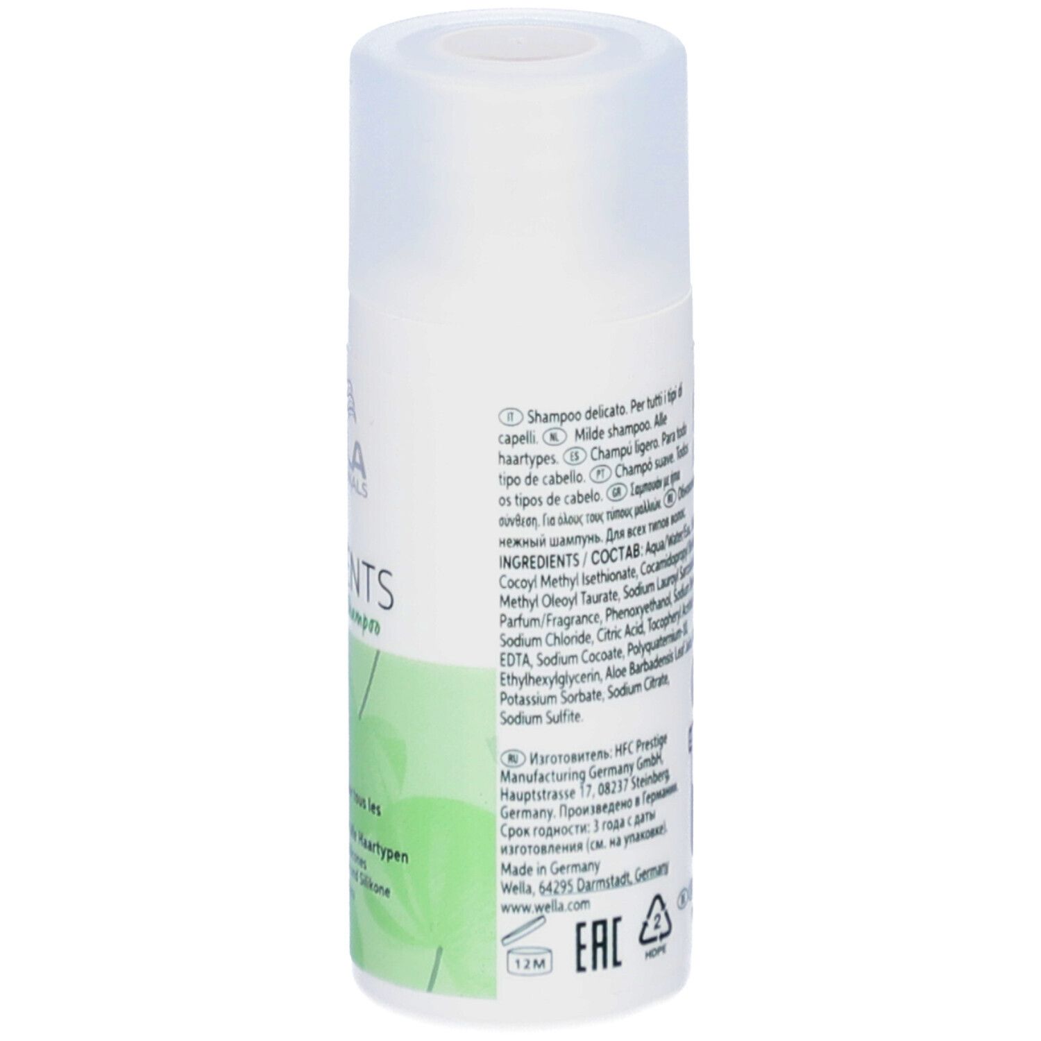 Achterkant van de shampoo fles. Tekst in meerdere talen. Ingrediënten en fabrikant informatie.