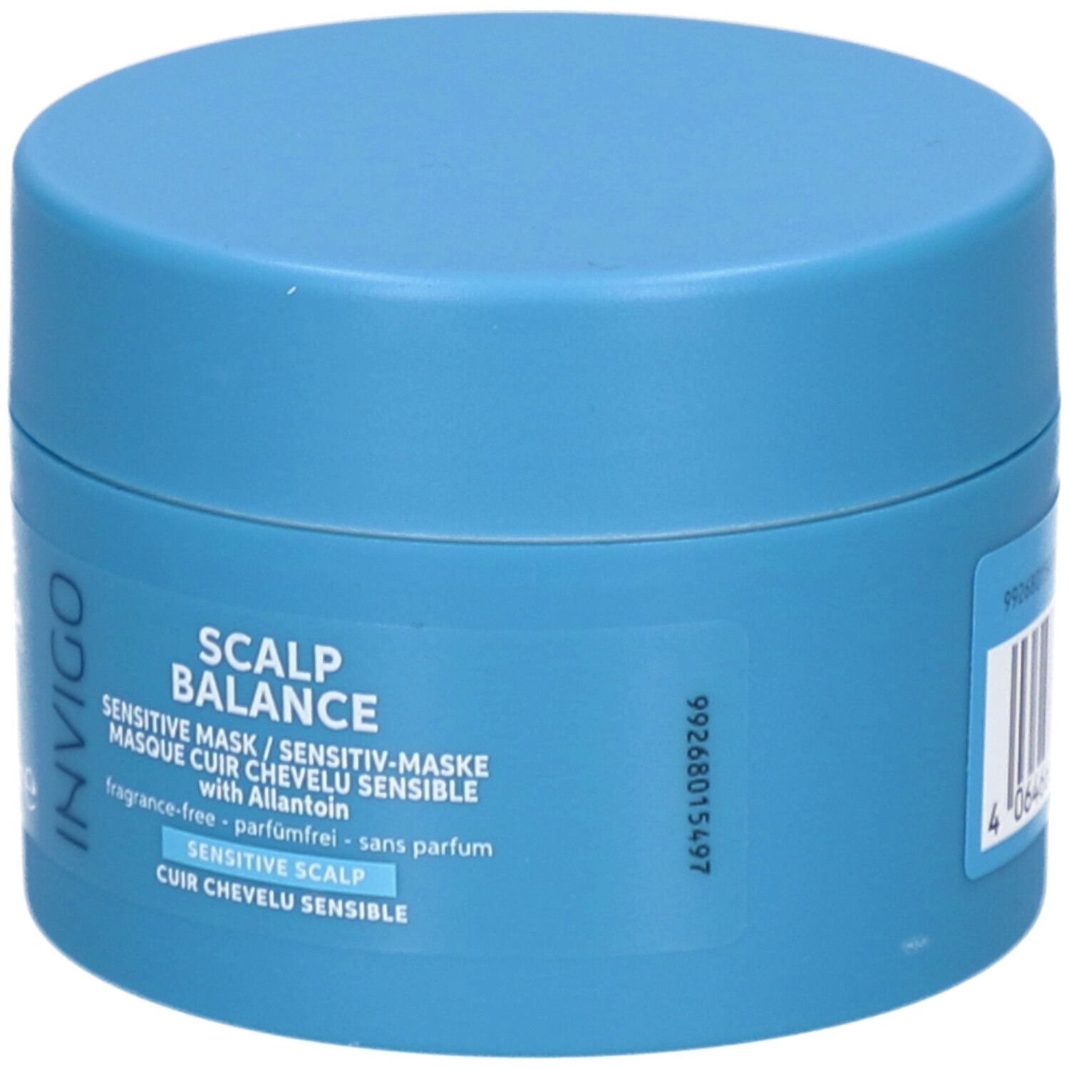 Pot bleu clair avec couvercle. Inscription : Invigo Scalp Balance Sensitive Mask. Logo Wella Professionals.
