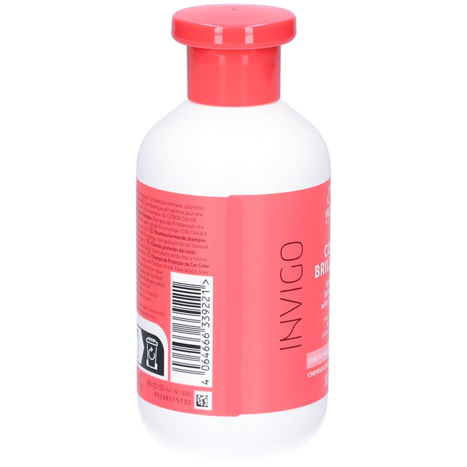 Dos du flacon blanc à bouchon rouge. Étiquette avec texte et code-barres. Symbole de recyclage.