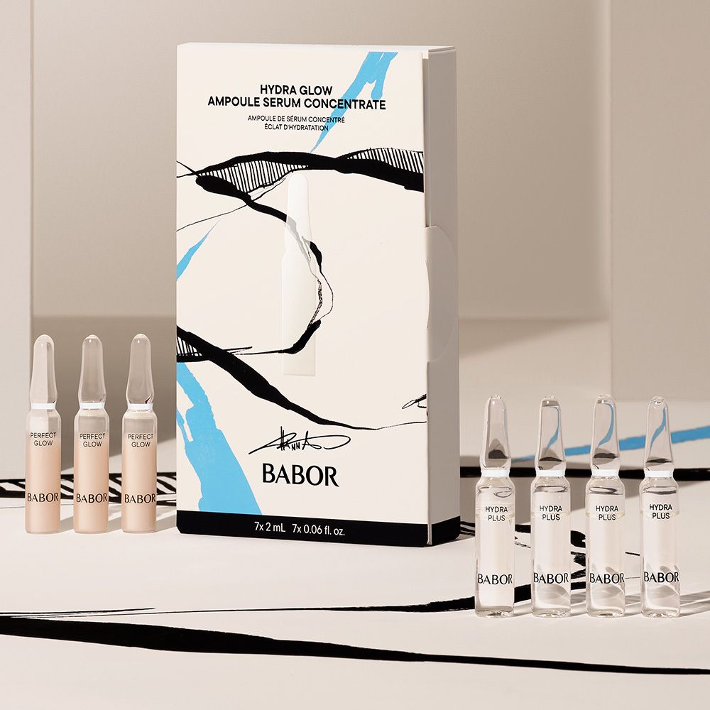 Verpakking met ampullen. 6 ampullen naast de verpakking. "BABOR" en "PERFECT GLOW" zichtbaar.