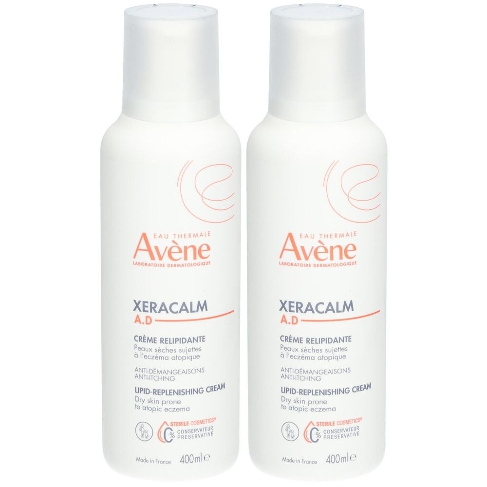 Deux flacons Avene Xeracalm A.D. Crème. Flacons blancs avec texte rouge et noir. 400 ml.