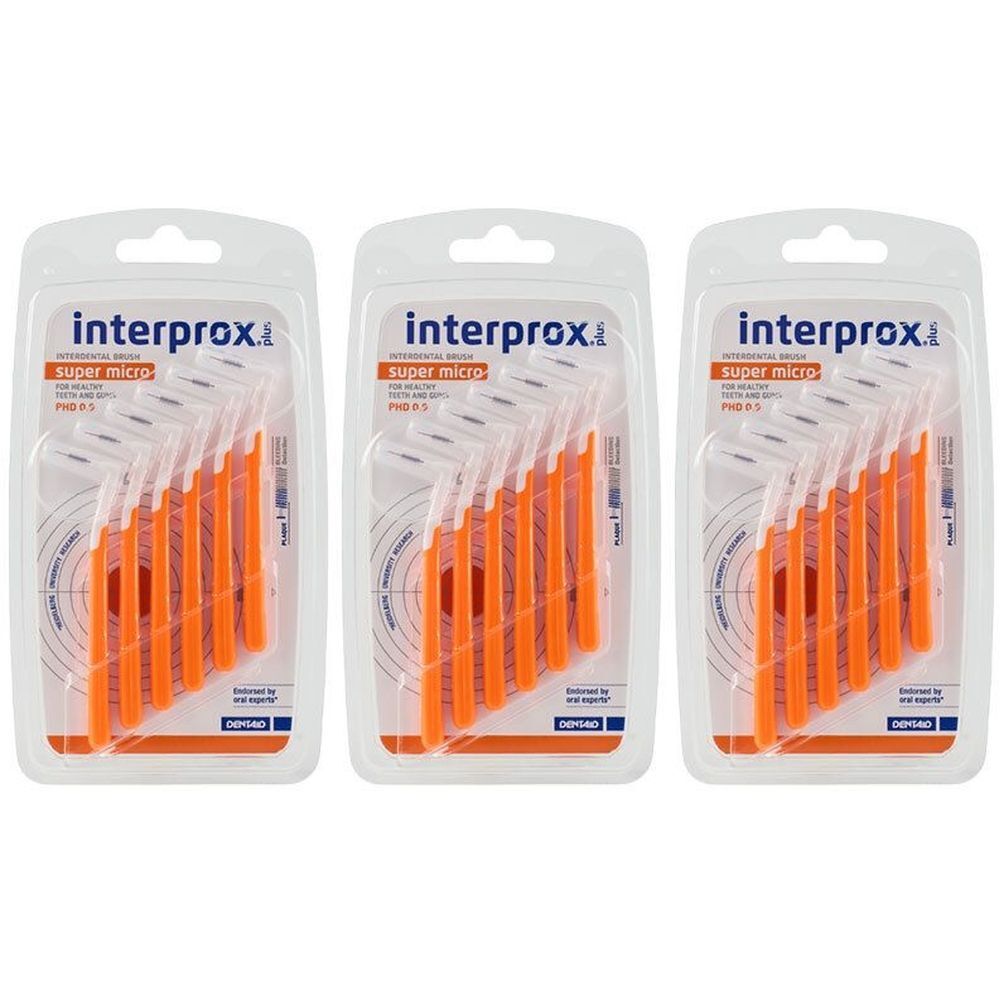 Drie blisters met oranje tandenstokers. Elke verpakking bevat meerdere borstels met een witte borstelkop.