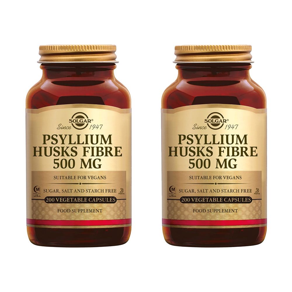 Twee flessen Solgar Psyllium Husks Fibre 500 mg. Bruine glazen flessen met gouden doppen en etiketten.