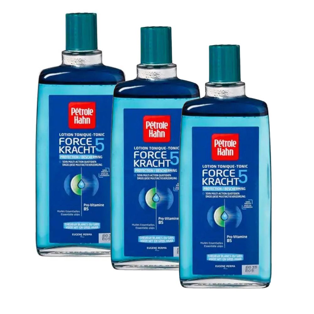 Drie flessen met blauwe vloeistof. Op elke fles staat "Pétrole Hahn FORCE 5 KRACHT".