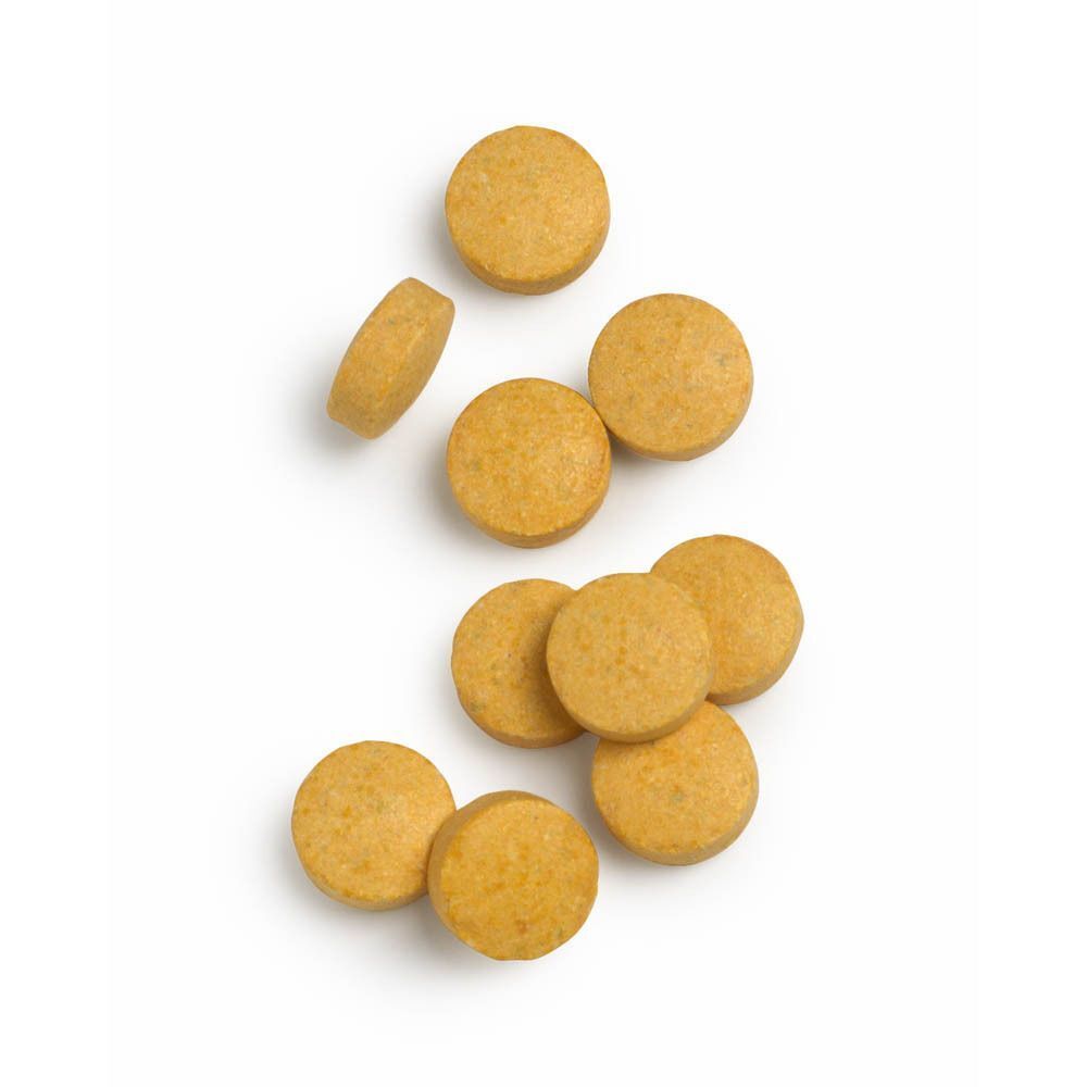 Een witte container met B-Active Complex™ en meerdere tabletten ernaast. Witte dop.