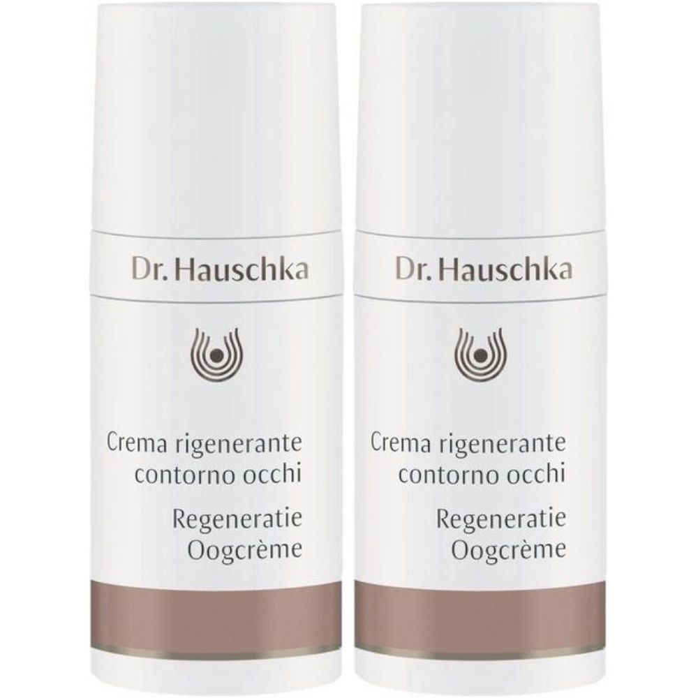 Deux flacons blancs avec bande marron. Inscription : Dr. Hauschka, Creme regenerante contorno occhi, Regeneration Oogcrème.