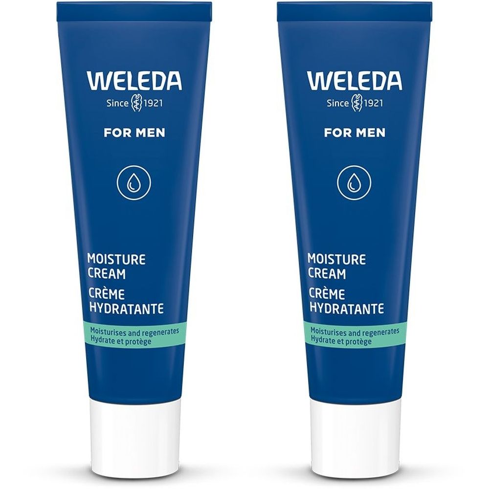 Deux tubes bleus avec bouchon blanc. Inscription : WELEDA, Since 1921, FOR MEN, MOISTURE CREAM, CRÈME HYDRATANTE. Hydrate et protège.