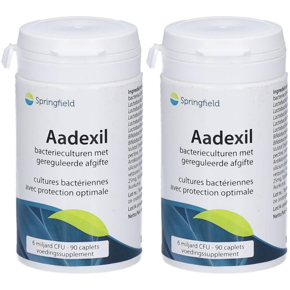 Twee witte flessen met Aadexil. Opschrift: bacterieculturen met gereguleerde afgifte. 90 caplets.