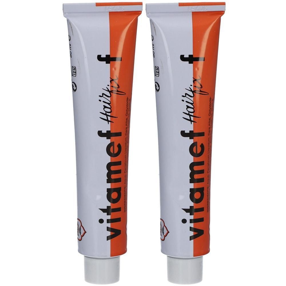 Deux tubes de Vitamef Hairfix. Tubes blancs avec bande orange et texte. Logos et texte rouges.