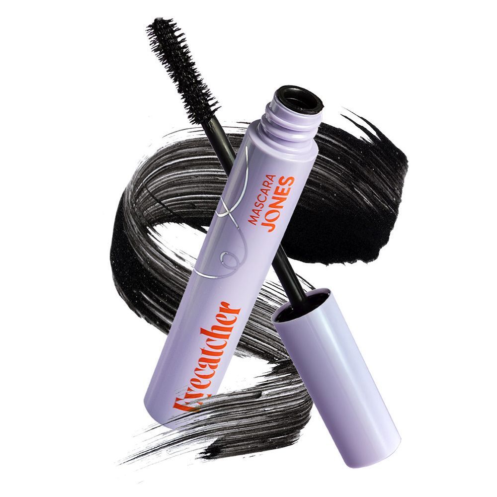 Mascara tube en borstel met zwarte mascara streep. Lila tube met oranje tekst.