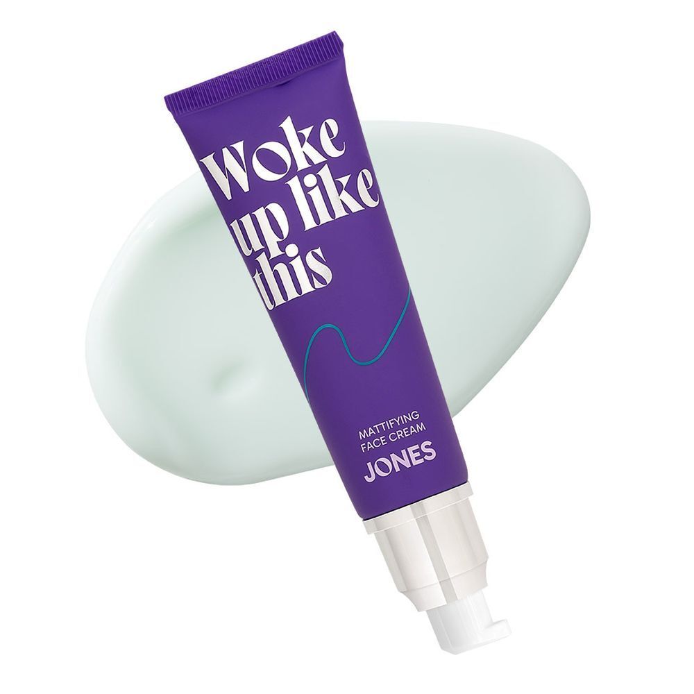 Paarse tube met zilveren dop en productmonster. Opschrift: Woke up like this. Merk: JONES.