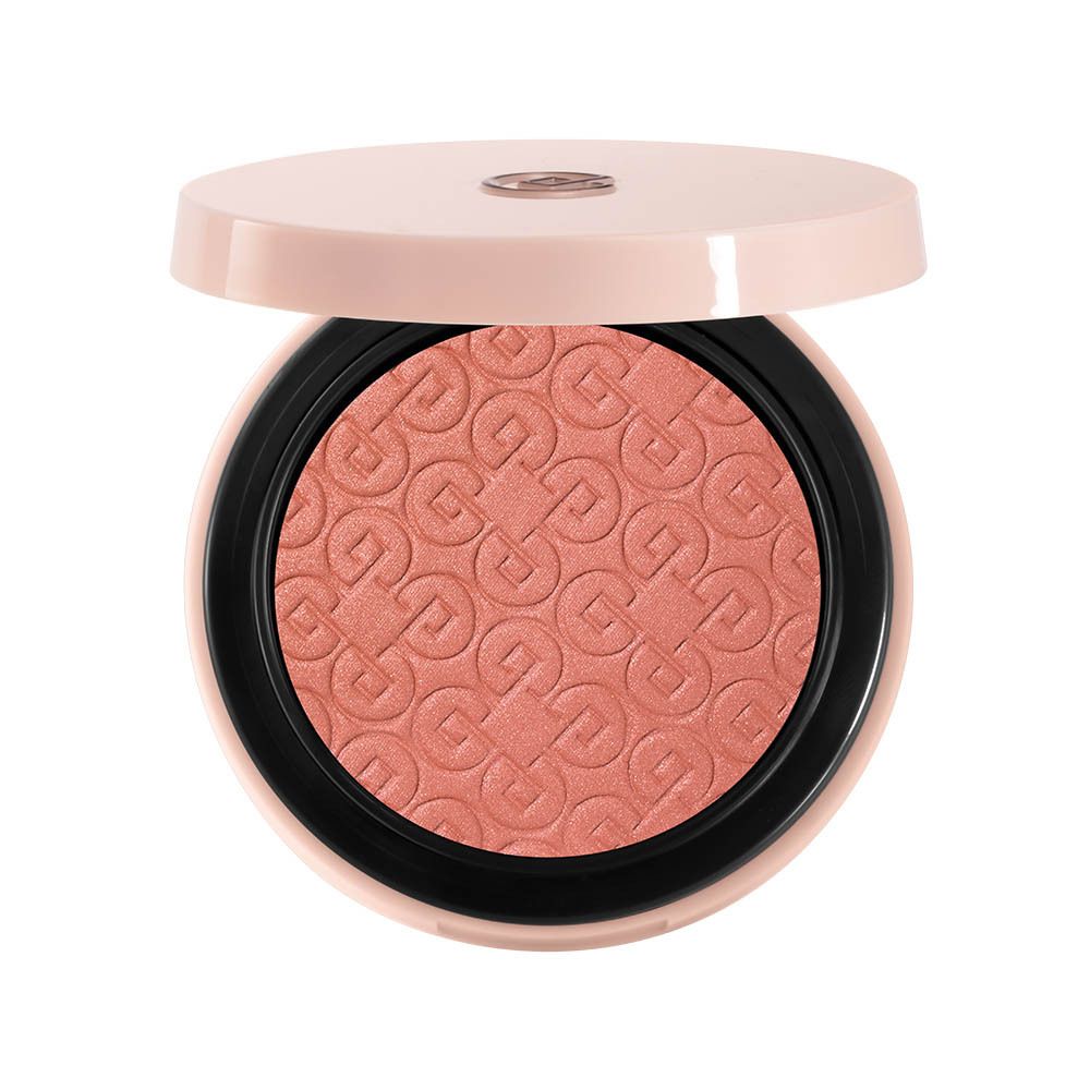 Ronde blush compact, open. Roze tint met reliëf patroon. Deksel open.