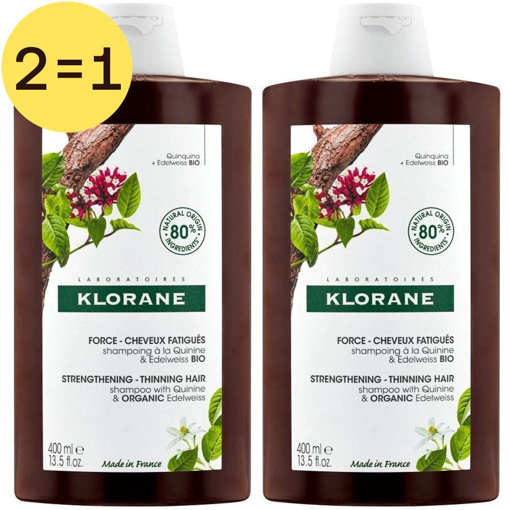 Twee flessen Klorane shampoo. Label met tekst: "Force - Cheveux Fatigués". 2 voor 1.
