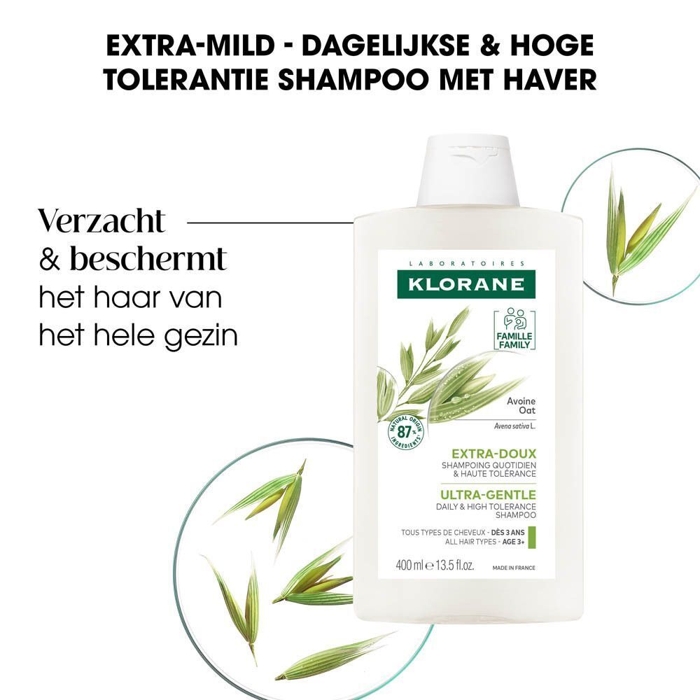 Shampoo fles. Wit, groen etiket. Merk: KLORANE. Tekst: Extra-Mild, Dagelijkse & Hoge Tolerantie Shampoo met Haver. 400 ml.
