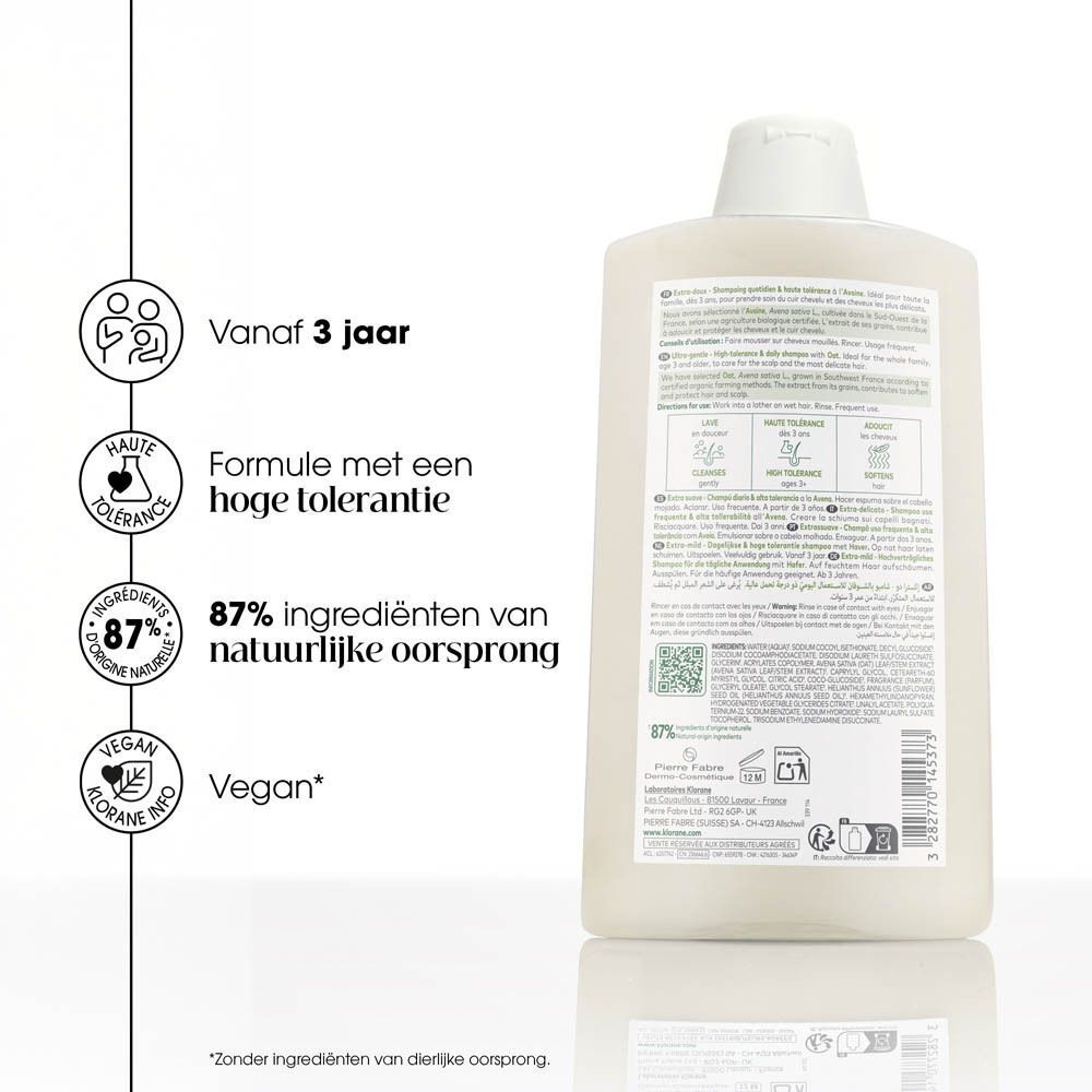 Achterkant van een shampoo fles. Wit. Tekst en symbolen. Merk: KLORANE. Informatie over ingrediënten en certificeringen.
