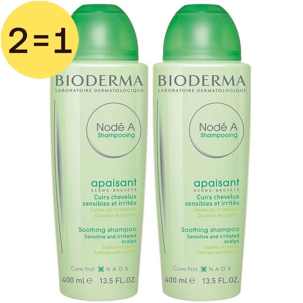 Deux flacons de shampooing verts avec bouchons verts. Inscription: Nodé A Shampooing, apaisant, pour cuirs chevelus sensibles. Offre 2=1.
