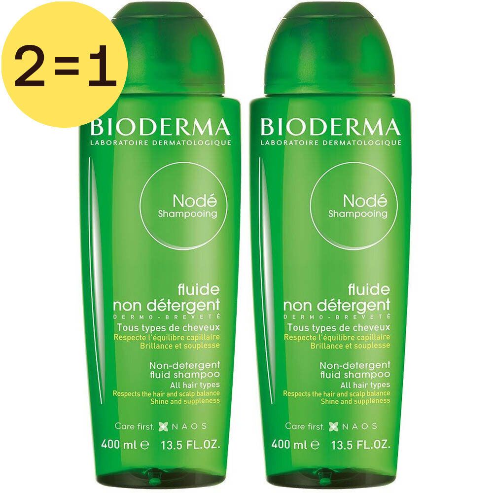 Twee groene shampoo flessen. Opschrift "Node Shampooing". Gele cirkel met "2=1". 