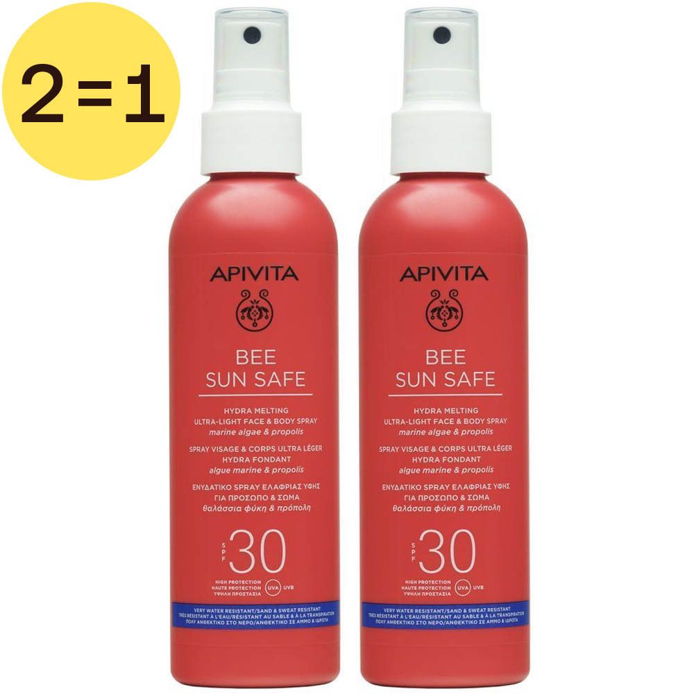 Twee rode sprays met witte sproeikop. Opschrift: APIVITA BEE SUN SAFE, SPF30. Geel label met "2=1".