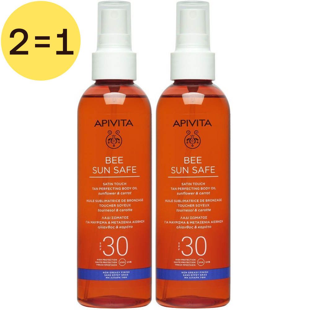 Twee oranje sprayflessen. Opschriften: APIVITA, BEE SUN SAFE, SPF 30. Gele cirkel met "2=1".