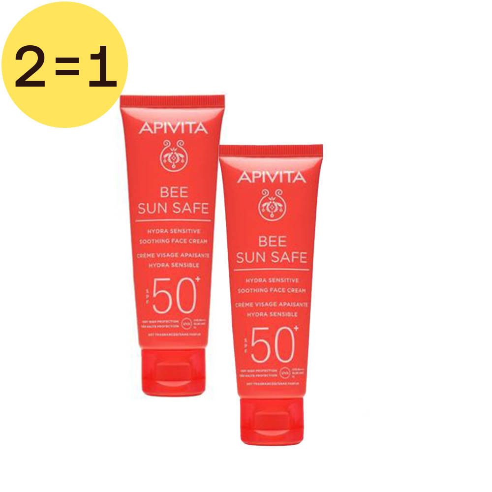 Twee tubes rode zonnecrème. Opschrift: APIVITA BEE SUN SAFE, SPF 50. Gele cirkel met "2=1". 