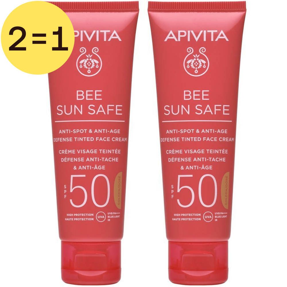 Deux tubes de crème solaire rouge. Inscription: BEE SUN SAFE, SPF 50. Étiquette jaune avec "2=1".