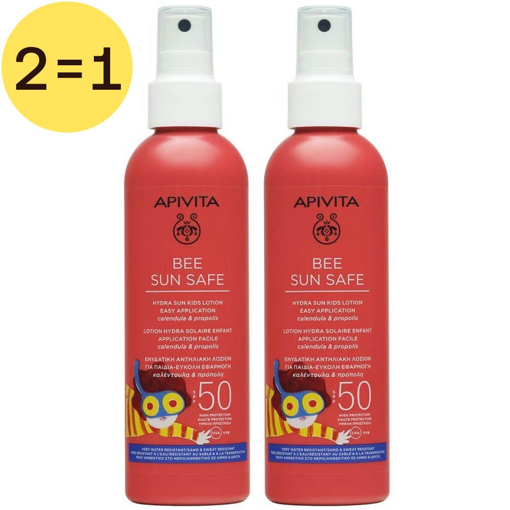 Deux flacons rouges avec vaporisateur blanc. Inscription: APIVITA BEE SUN SAFE, SPF 50. Étiquette jaune avec "2=1".