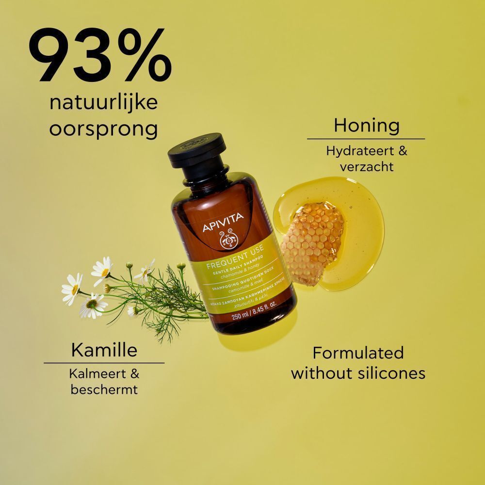 Shampoo fles met kamille, honing en tekst: 93% natuurlijke oorsprong, Honing, Kamille, Formulated without silicones.
