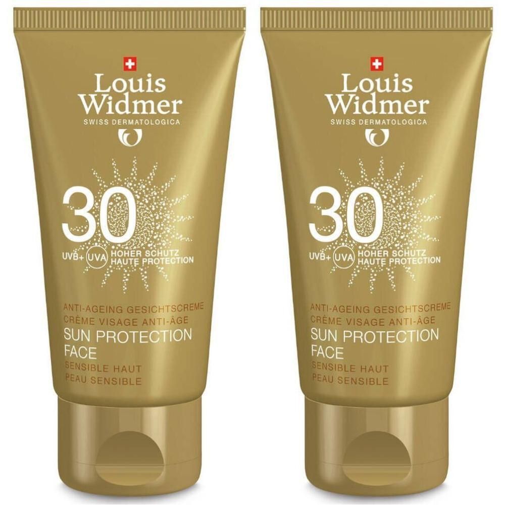 Twee goudkleurige tubes Louis Widmer zonnecrème SPF 30. Tekst: Anti-ageing, gezicht, Sun Protection, gevoelige huid.