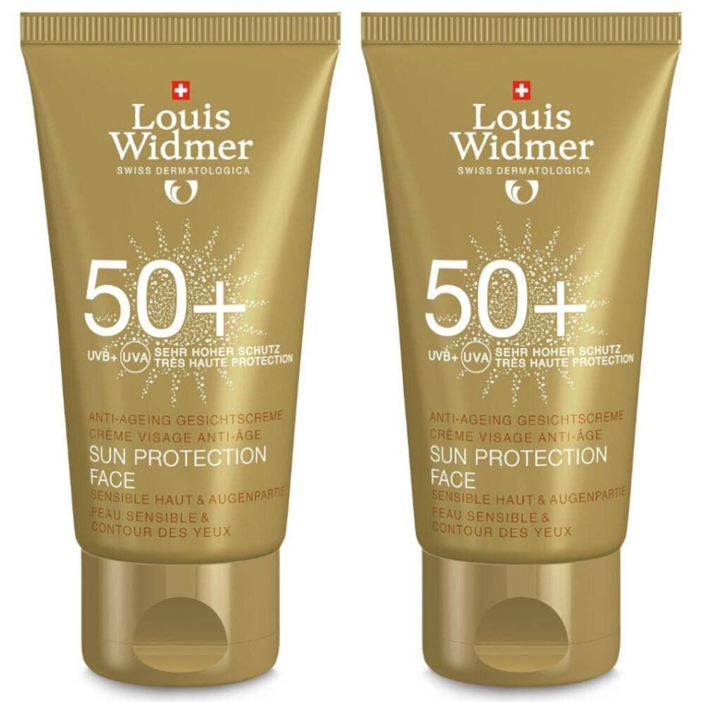 Twee goudkleurige tubes Louis Widmer Sonnenschutzgesicht SPF50+. Opschrift: 50+, Sun Protection Face, voor gevoelige huid.