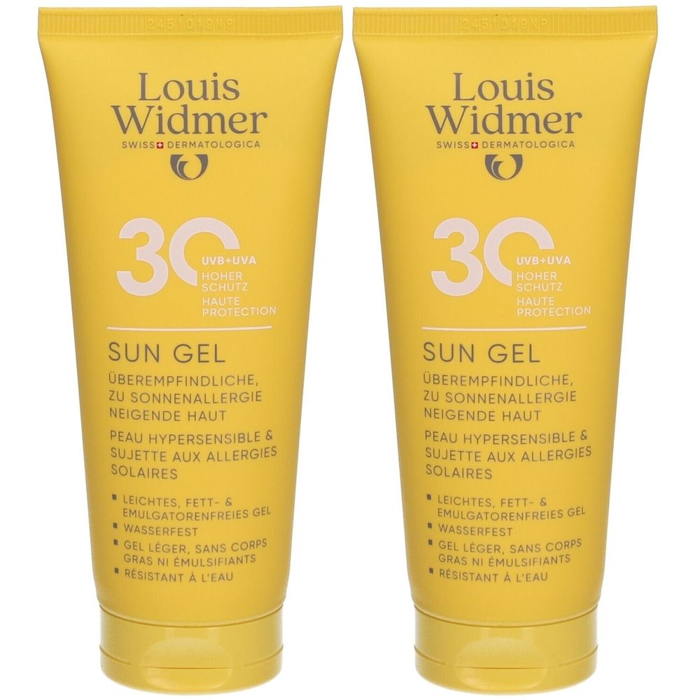 Twee gele tubes zonnebrandgel. Opschrift: Louis Widmer Sun Gel 30. Tekst in het Duits en Frans.