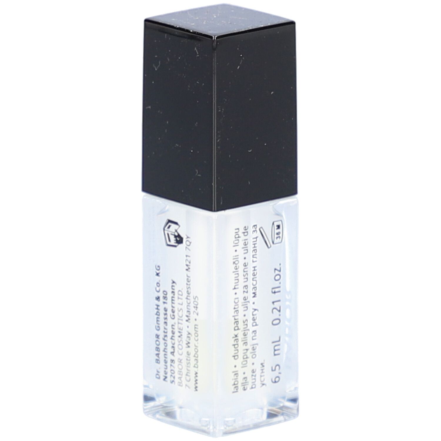 Flacon d'huile à lèvres transparent avec bouchon noir. Inscription : 6,5 ml 0,21 fl.oz. et adresse.