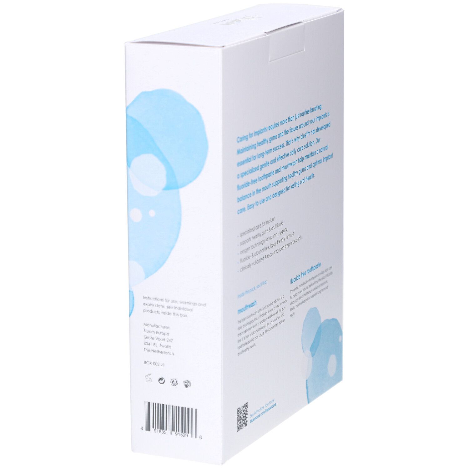 Vue latérale de la boîte blanche. Texte sur l'hygiène buccale pour implants. Inscription: bain de bouche, dentifrice sans fluor.