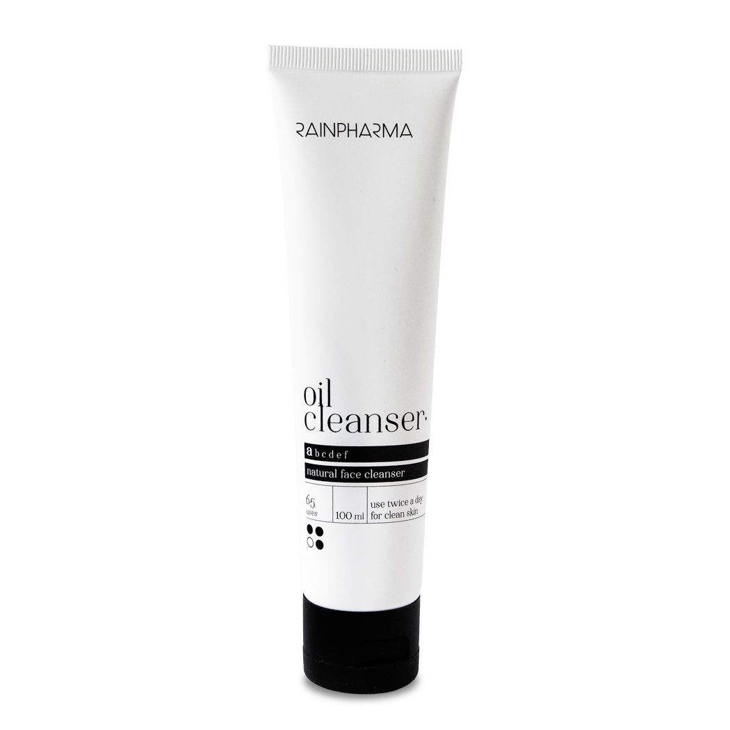 Witte tube met zwarte dop. Opschrift: Rainpharma, oil cleanser, abcdef, natural face cleanser.