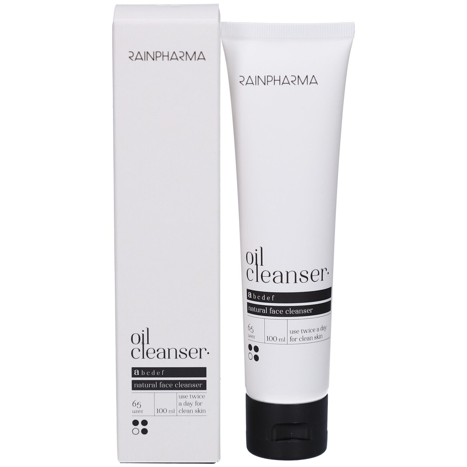 Product en verpakking. Witte tube en doos. Opschrift: Rainpharma, oil cleanser, abcdef, natural face cleanser.