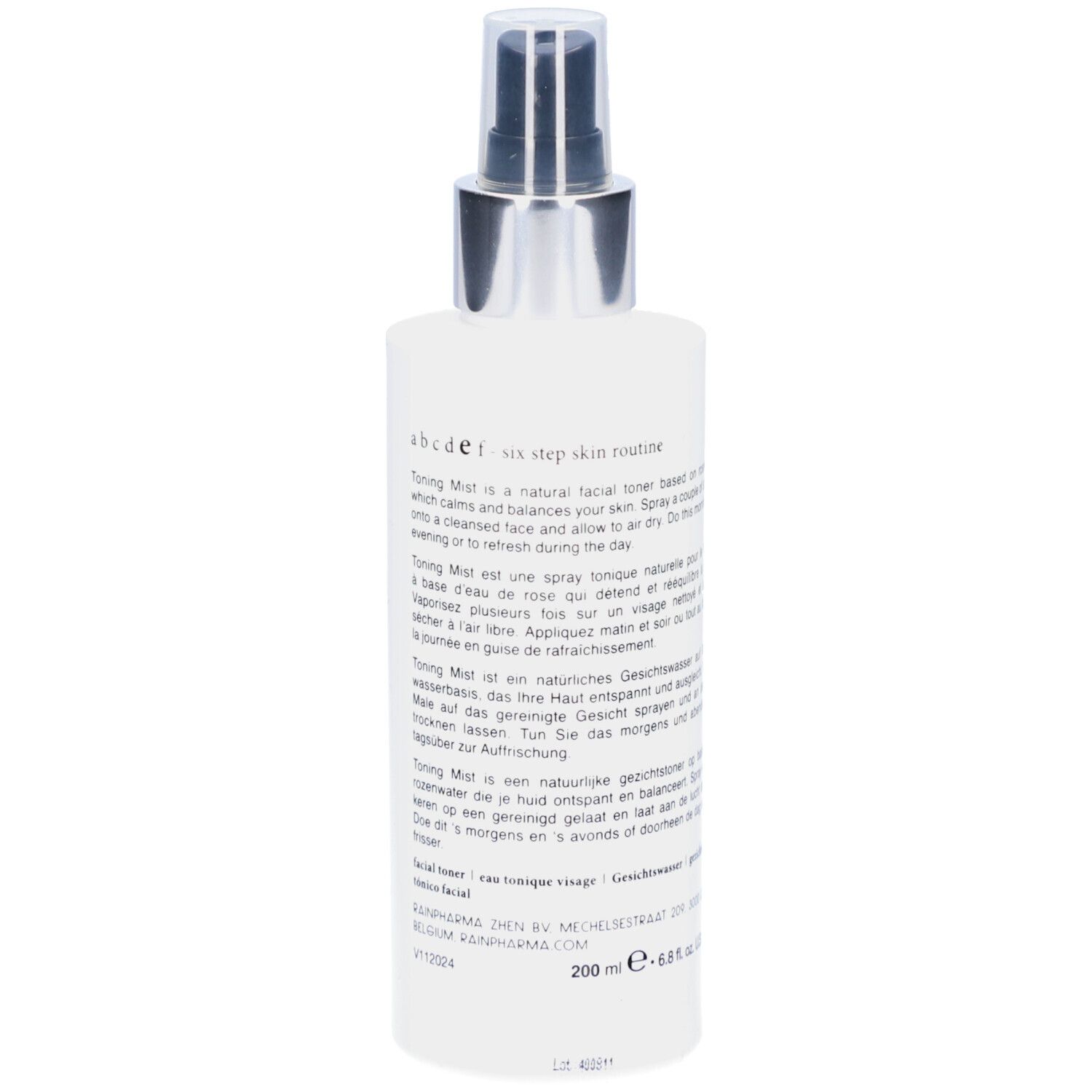 Achterkant van de witte fles met verstuiver. Tekst in meerdere talen. Merk Rainpharma. Productnaam Toning Mist.