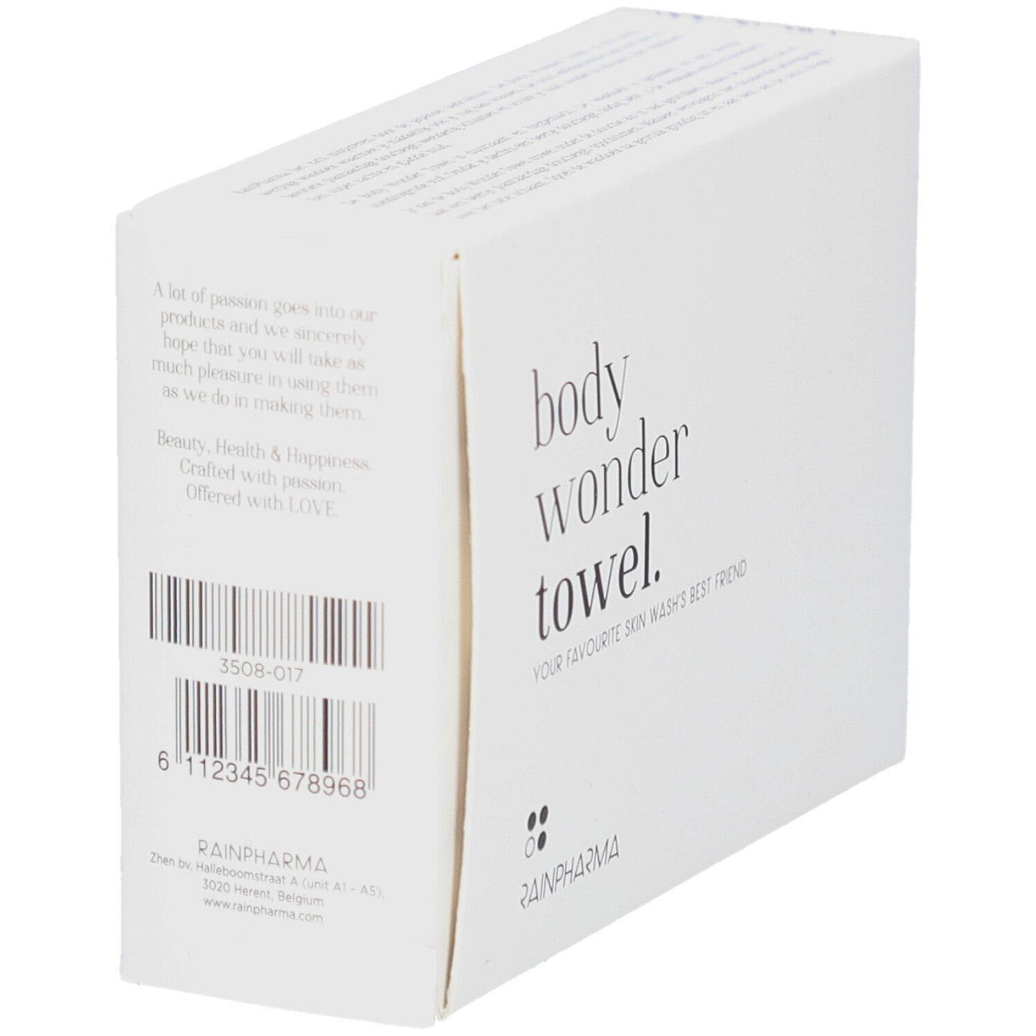 Emballage blanc avec texte et code-barres. Texte : "body wonder towel.", "YOUR FAVOURITE SKIN WASH'S BEST FRIEND". Logo Rainpharma. Code-barres.
