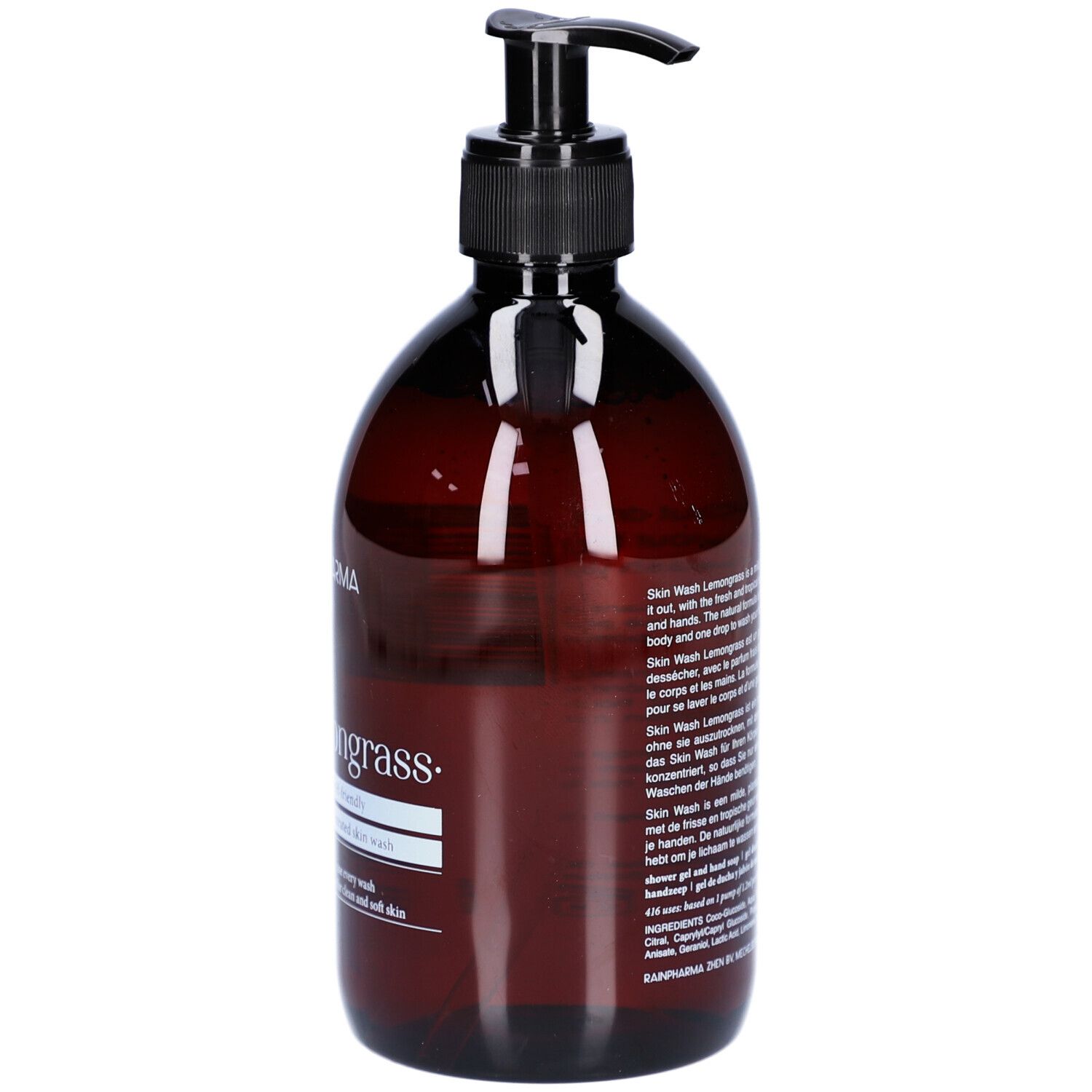 Bruine fles met zwarte pomp. Opschrift: Skin Wash Lemongrass. Tekst in het Engels, Frans, Duits en Nederlands.