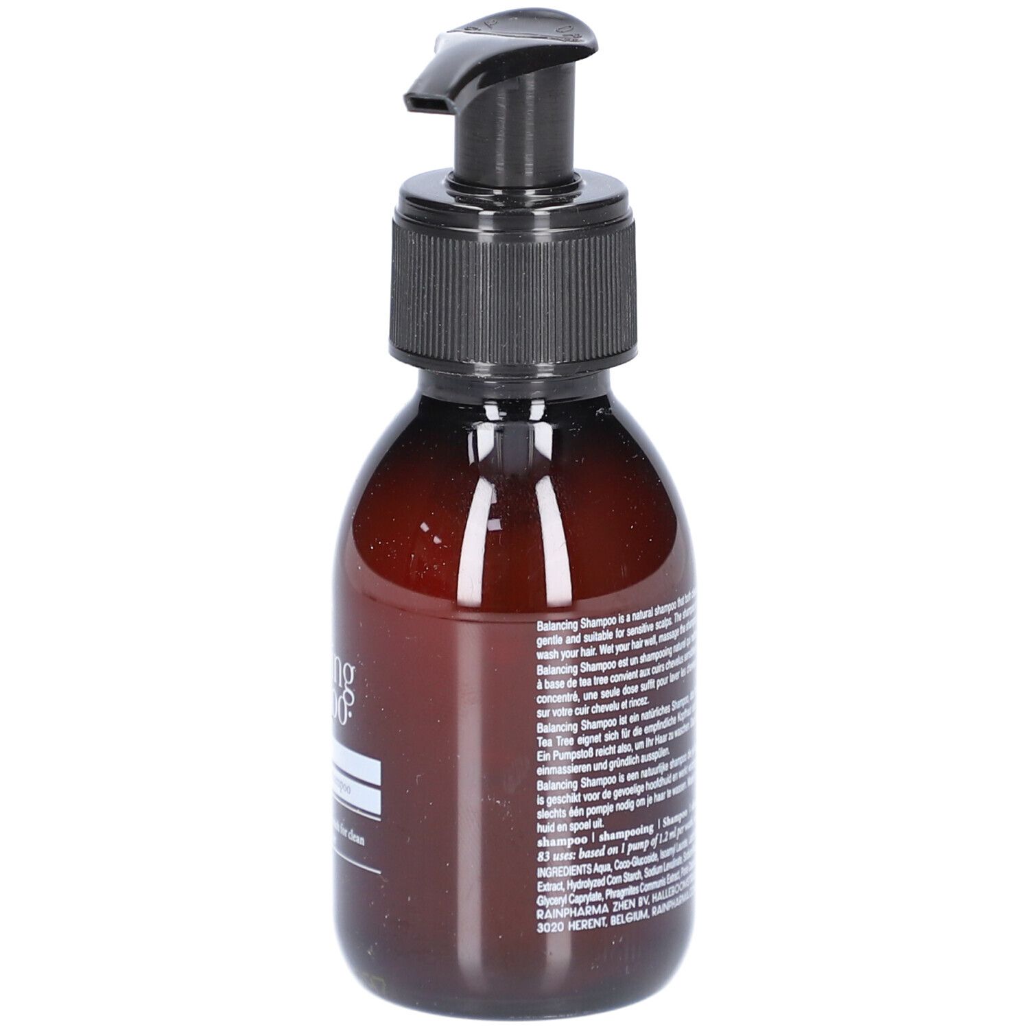 Bruine fles met zwarte pomp. Achterkant met tekst. Productnaam: Rainpharma balancing shampoo.