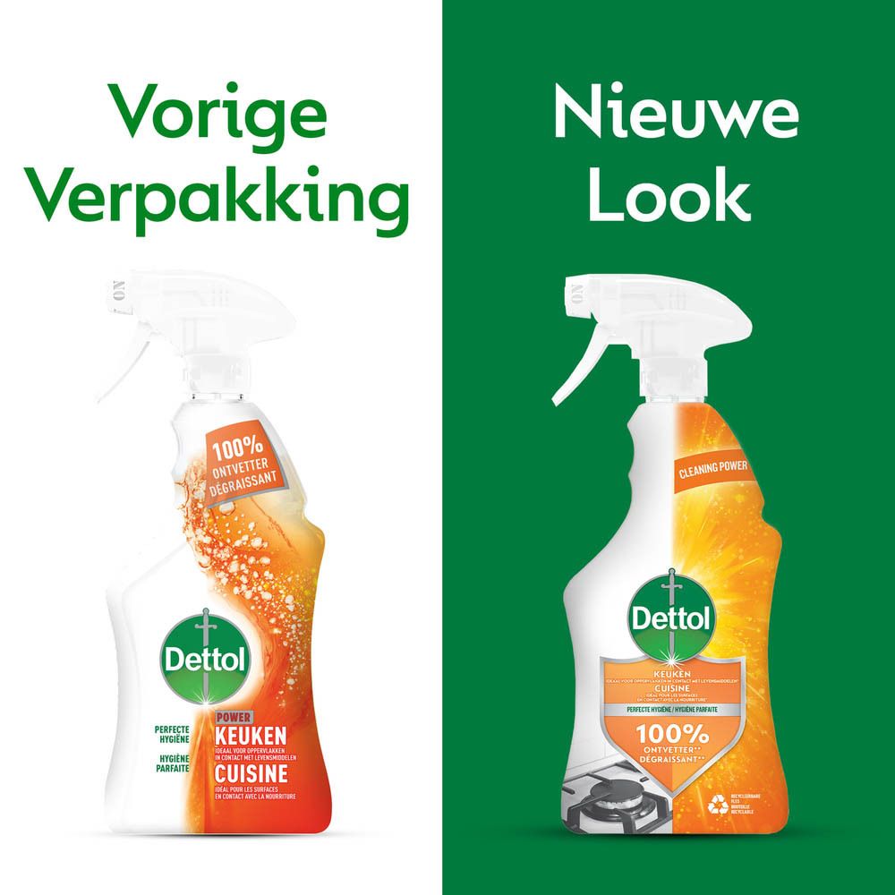 Reinigingssprayfles met sproeikop. Merk Dettol, opschrift 'Keuken' en 'Cuisine'. Oranje design.