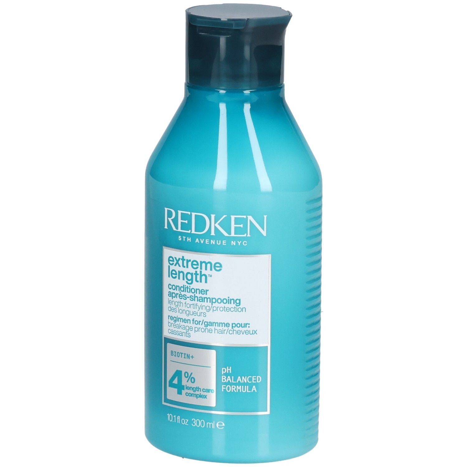 Turquoiseblauwe fles met donkerblauwe dop. Opschrift: REDKEN, Extreme Length Conditioner. Bevat Biotine+ en 4% Length Care Complex.