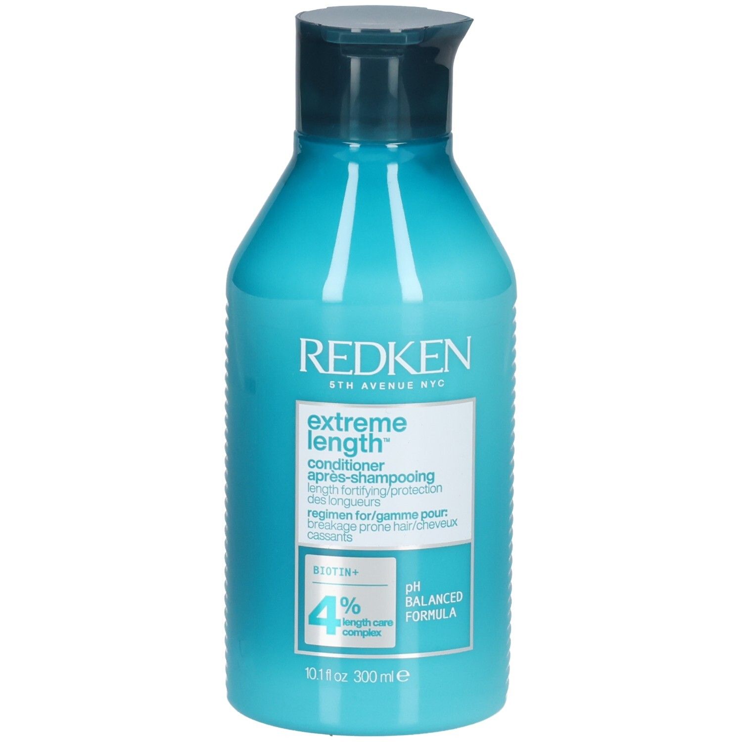 Turquoiseblauwe fles met donkerblauwe dop. Opschrift: REDKEN, Extreme Length Conditioner. Bevat Biotine+ en 4% Length Care Complex.