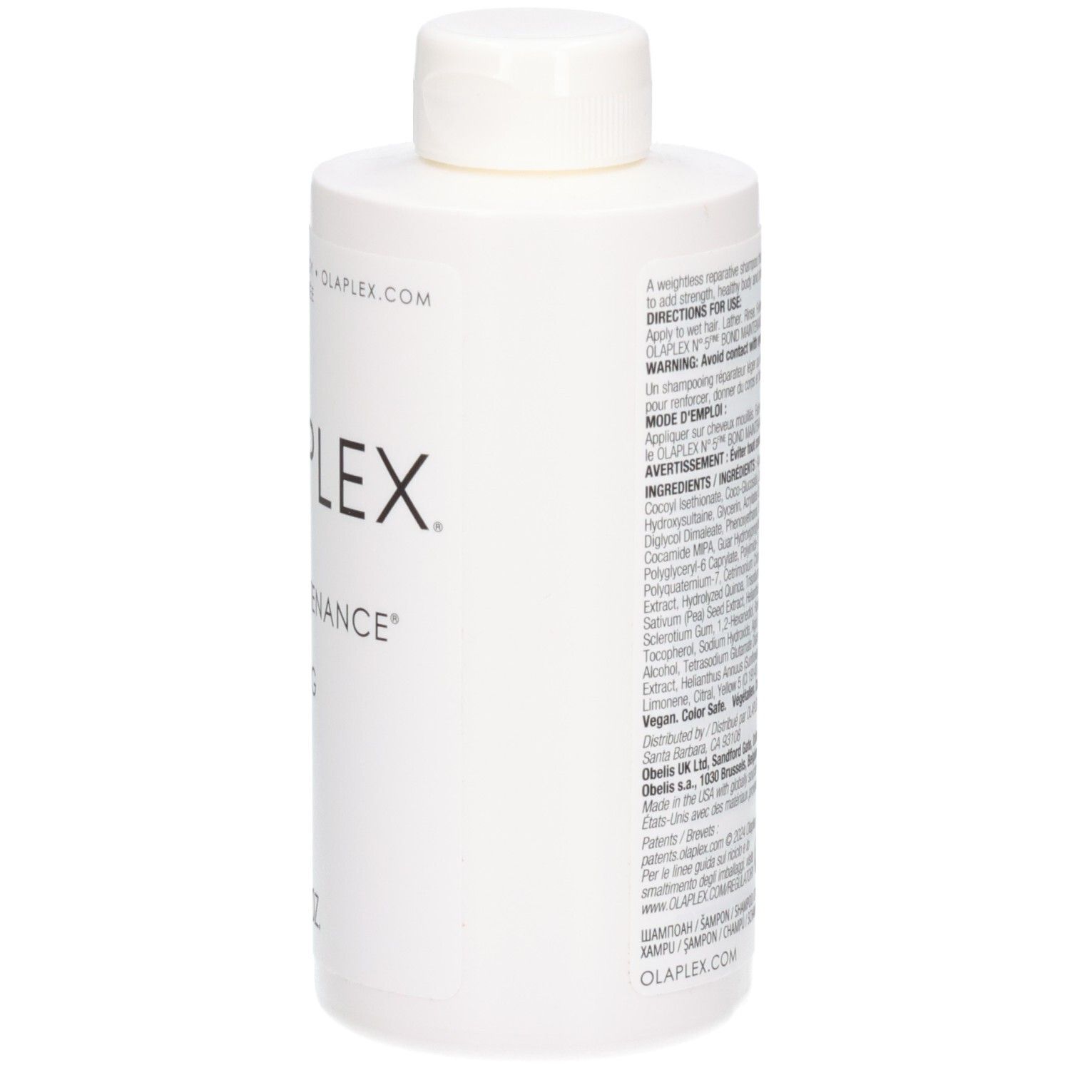 Zijaanzicht van een witte Olaplex No.4 Fine Bond Maintenance Shampoo fles met instructies.