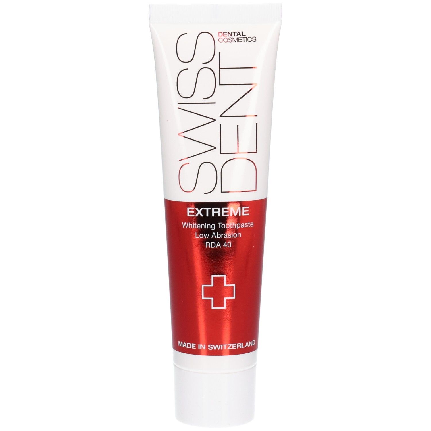 Wit-rode tandpastatube. Opschrift SWISS DENT, EXTREME, Whitening Toothpaste. Rood kruis. Made in Switzerland.