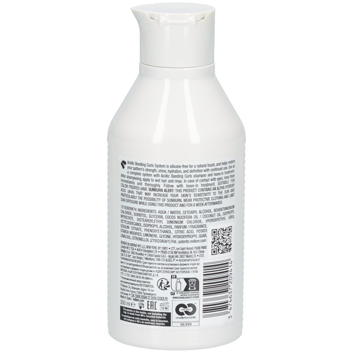 Achterkant witte fles Redken Acidic Bonding Curls Conditioner. Bevat ingrediënten, QR-code en recyclingsymbolen.